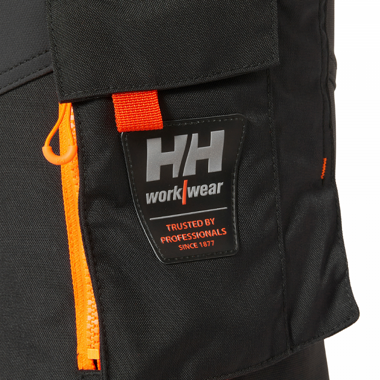 HELLY HANSEN CONSTRUCTION PANT CLASS 1, από το Molossos Wear, χρώμα orange, 58C.